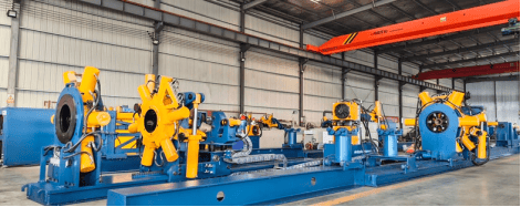 Iron Roughneck vs Bucking Unit: 7 Essential Differences 4 Galip bucking unit for premium tubular make-up and break-out in a workshop