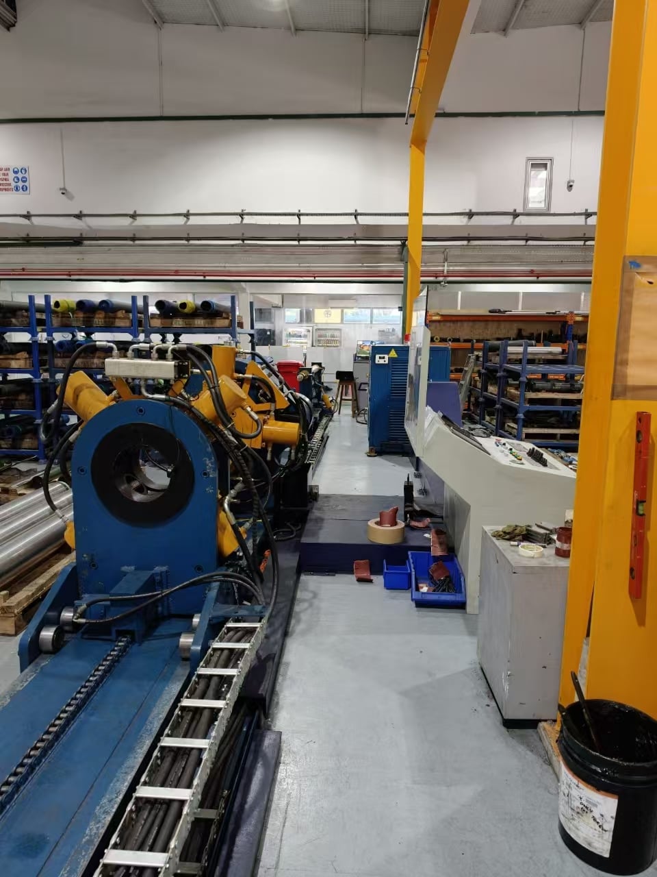 Pup Joints, Crossover Subs and Casing Accessories: What Each One Is, and Where It Is Threaded and Made Up 3 Hydraulic bucking unit rotational head with a tubular loaded, beside its control console in a workshop