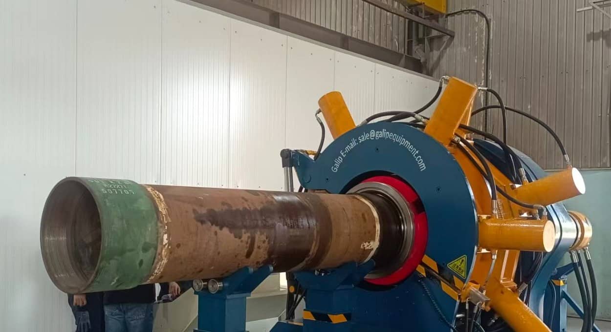 Casing Coupling Make-Up: 12 Controls for OCTG Threading Shops 4 Large tubular loaded in a Galip hydraulic torque machine at a customer workshop.
