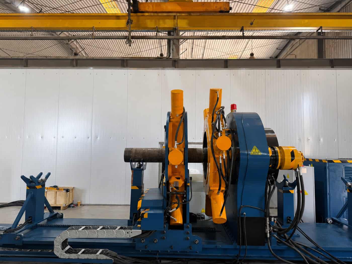 What Is Upstream Oil and Gas, and Where Do Its Threaded Connections Get Made Up? 1 Horizontal bucking unit bench with a tubular loaded between the clamp and the rotating head
