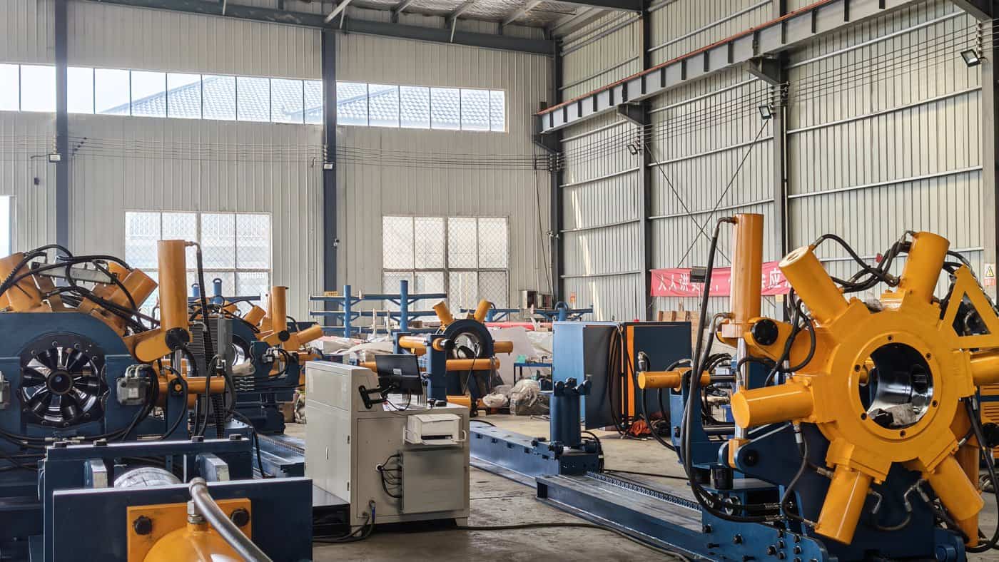 Third-Party Torque Turning: What the Service Covers, What the Report Must Prove, and When to Bring It In-House 3 Row of bucking units at final assembly on the production floor