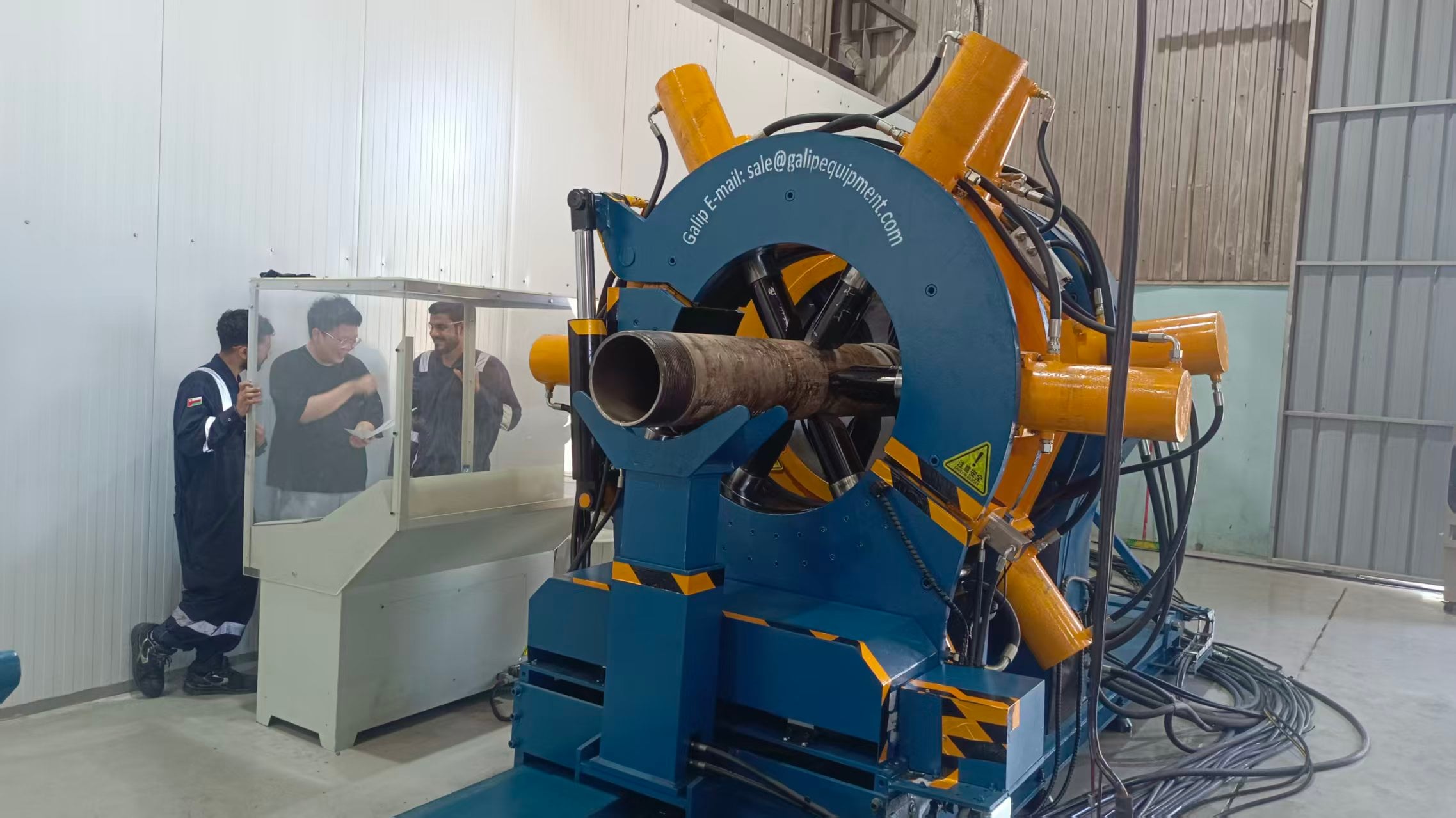 The Wellhead in Oil and Gas: Its Components, the Christmas Tree, and Where Threads Meet Flanges 3 Two engineers reviewing a make-up record at the control console of a GALIP bucking unit