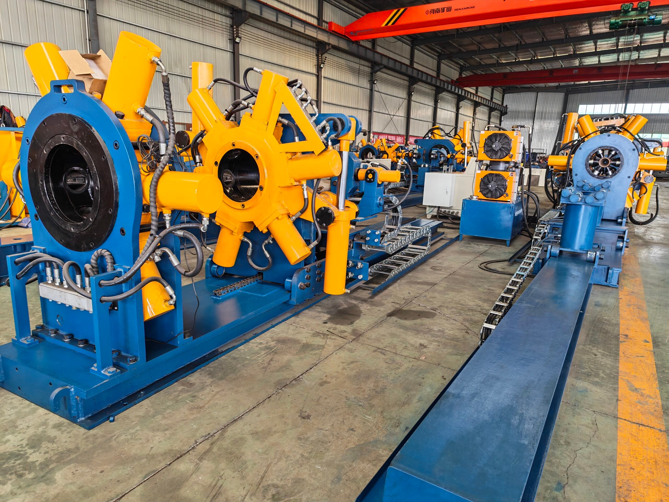 Well Cementing: How a Primary Cement Job Works, and the Shoe Track Made Up Before the Casing Is Run 1 Line of GALIP hydraulic bucking units on the factory floor, yellow clamp heads and hydraulic rams in the foreground
